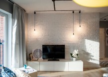Whitewashed-brick-wall-in-the-living-and-minimal-industrial-lighting-217x155