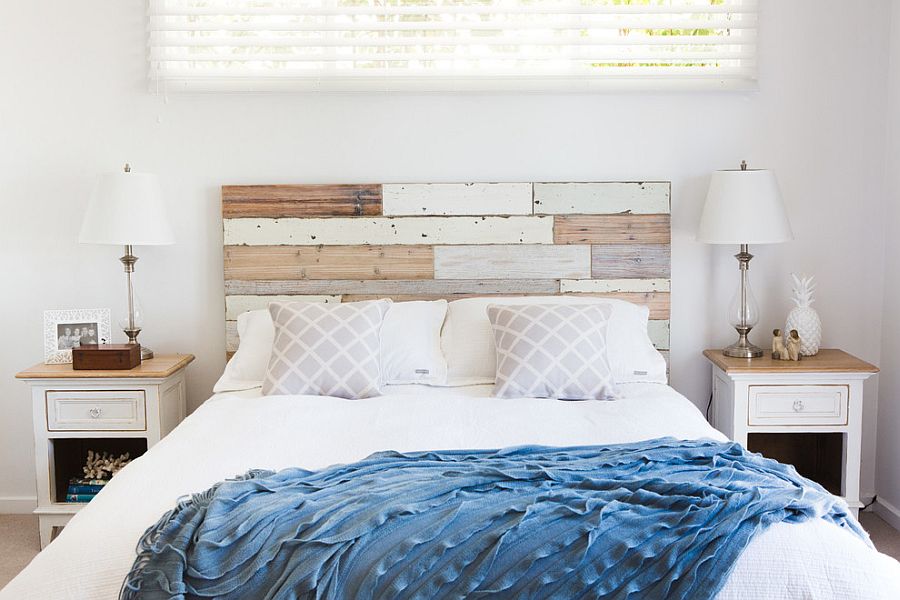 Wood panel headboard becomes a key elemnt in the shabby chic bedroom