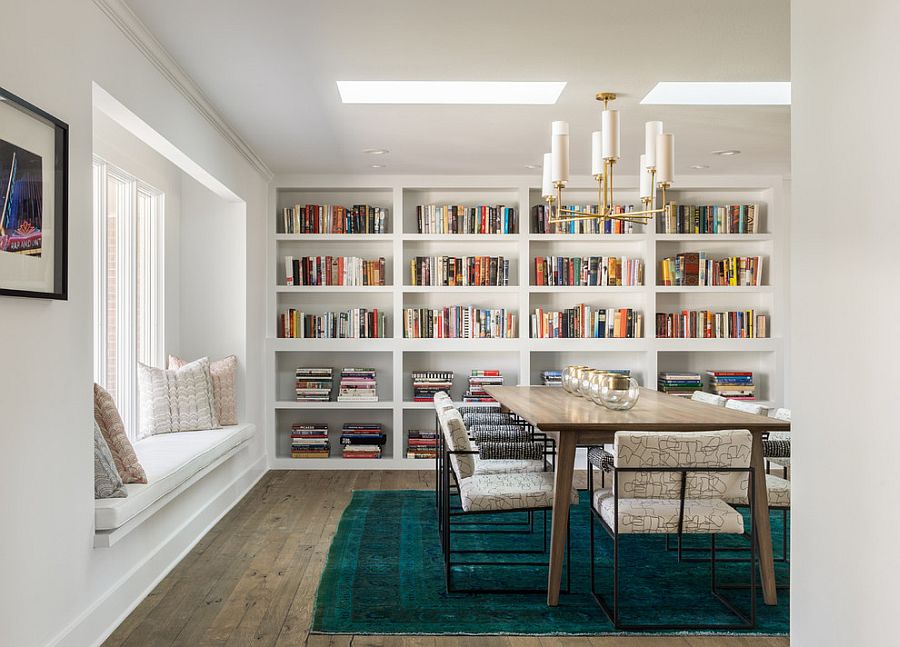 A flood of natural light and color scheme give the dining room an airy ambiance