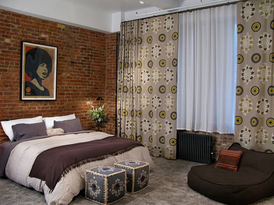 Accent brick wall in the bedroom with eclectic blend of prints [Design: 8.8 Design]