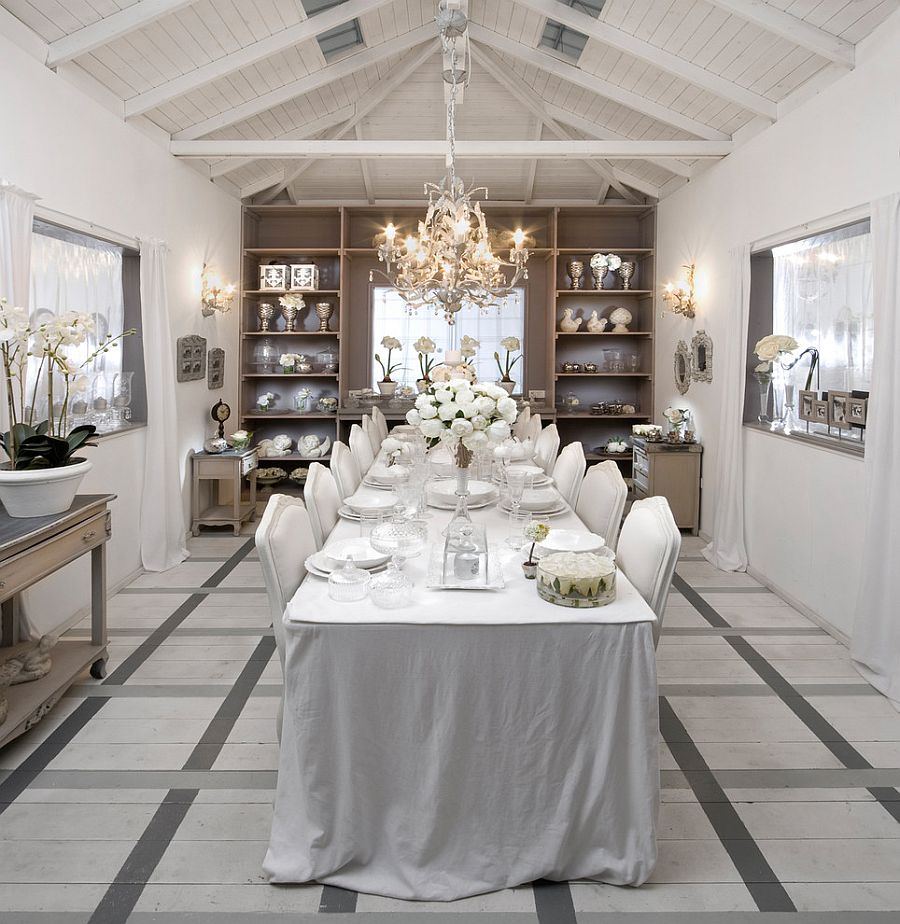 An all-white dining room captures the festive winter magic