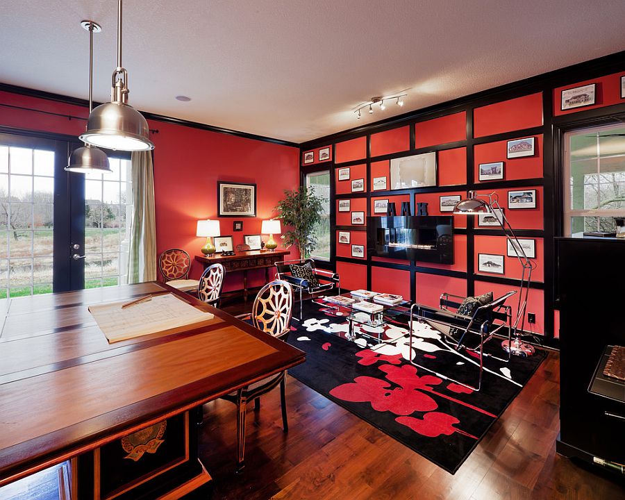 Antique red by Sherwin Williams gives the home office an energetic look [Design: Madi Mali Homes]