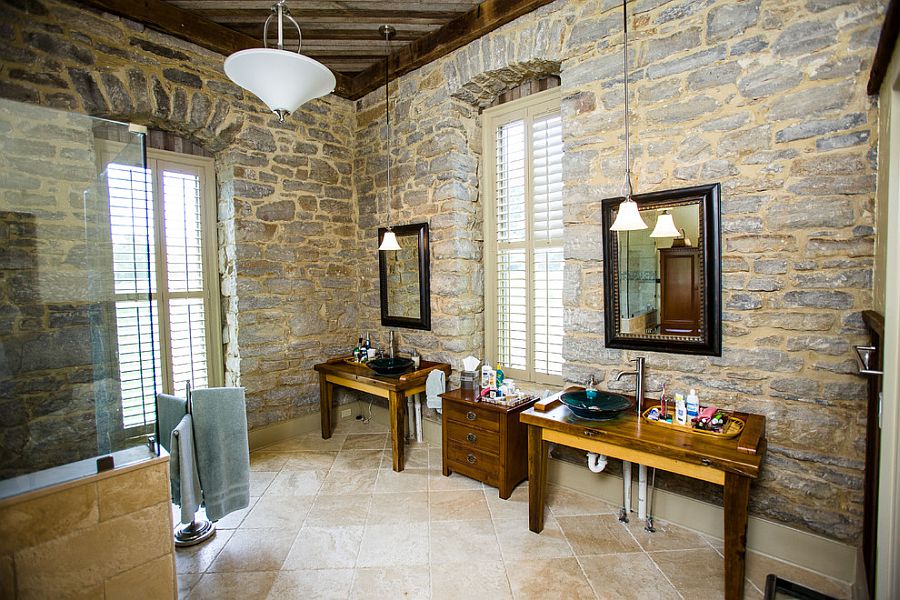 Bathroom inside 1800s Bourbon Distillery turned into a unique modern home [Design: Wilmes & Associates Architects]