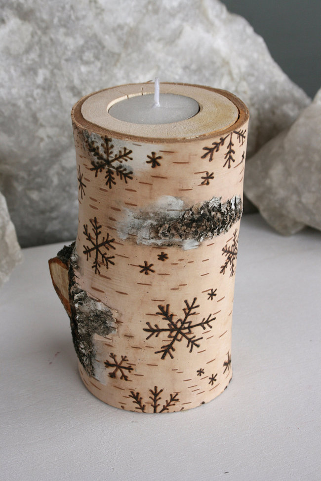 Birch wood candle holder with snowflake designs