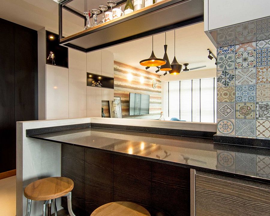 Blue Moroccan tiles add color to the contemporary kitchen