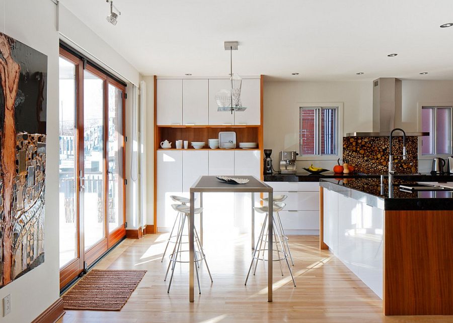 Breezy breakfast zone next to the kitchen siland with metallic bar stools