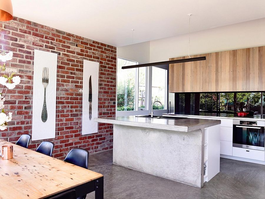 Brick wall backdrop in the kitchen connected with the backyrad