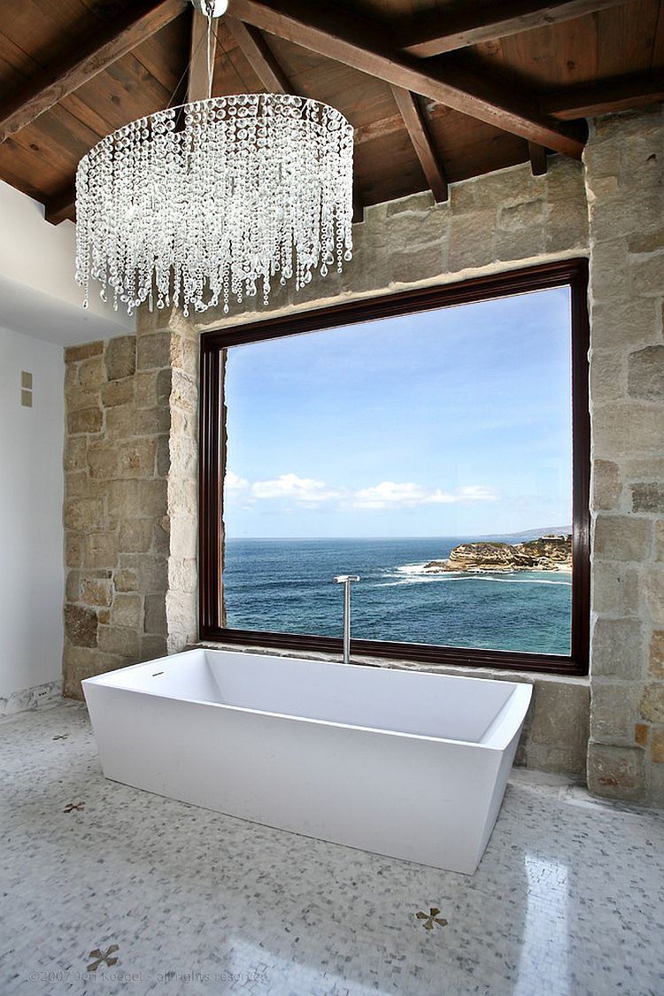 Brilliant antique stone and marble bathroom showcases modern Mediterranean style