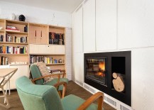 Cabinest-around-the-fireplace-provide-additional-storgae-space-217x155