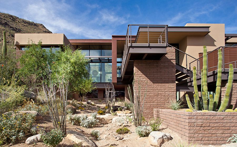 Color and finish of the contemporary home lets it blend with the rugged landscape around it