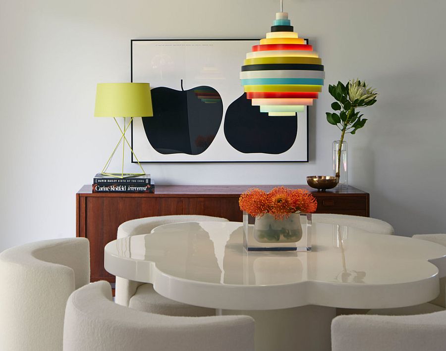 Colorful accent lighting in midcentury dining room [Design: Alison Damonte Design]