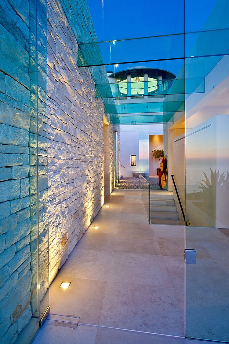 Contemporary entry of stylish San Diego home with in-floor lighting [From: Ron Neal Lighting Design]