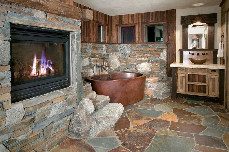 Copper bathtub and Flagstone Slate create a fabulous, rustic bathroom [Design: High Camp Home]