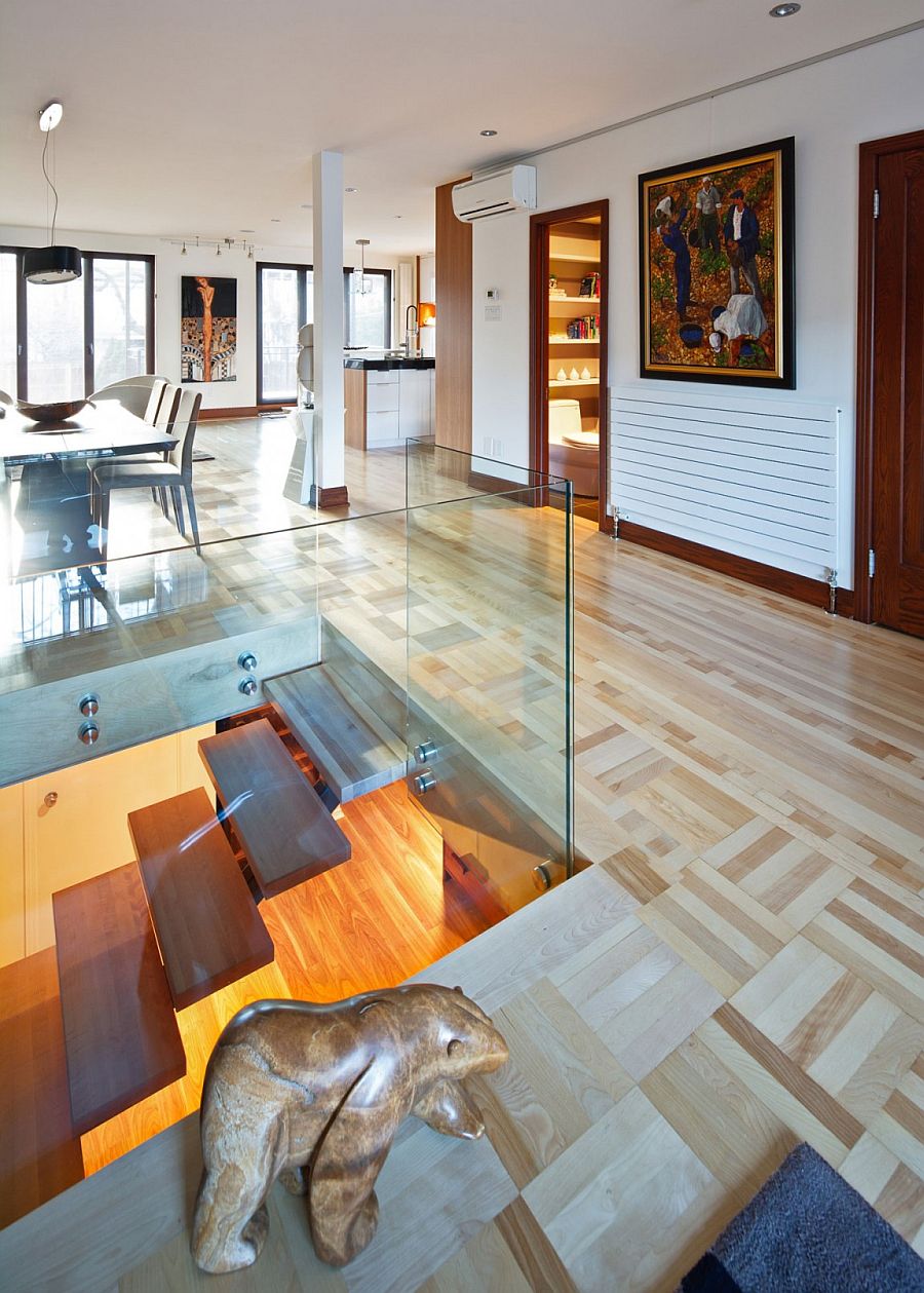 Cozy wooden flooring gives the interior an inviting ambiance