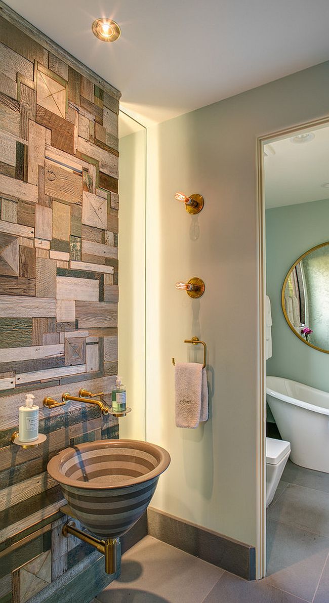 Custom crafted reclaimed wood wall doubles as an artistic addition in the contemporary bathroom