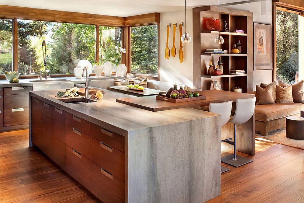 Custom walnut cabinets and Wild Sea Granite countertops inside the rustic modern kitchen