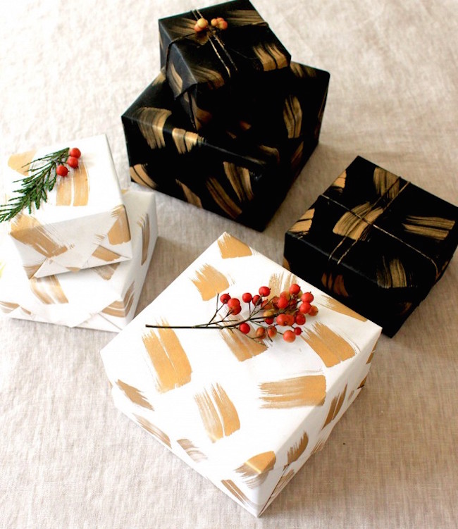 DIY holiday wrapping paper in gold, black, and white