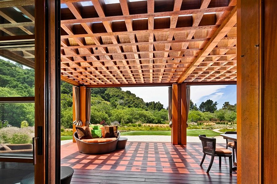 Design of the pergola extends the living area into the deck outside