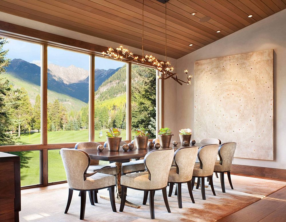 Dining room with unabated views of Vail slopes and a sparkling chandelier