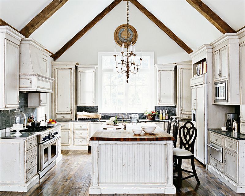 Distressed look of the cabinets steals the show in this spacious kitchen [Design: Harrison Design Associates]