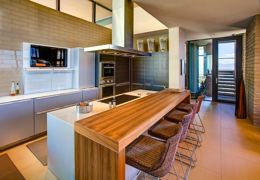 Ergonomic modern kitchen design with central island and breakfast nook