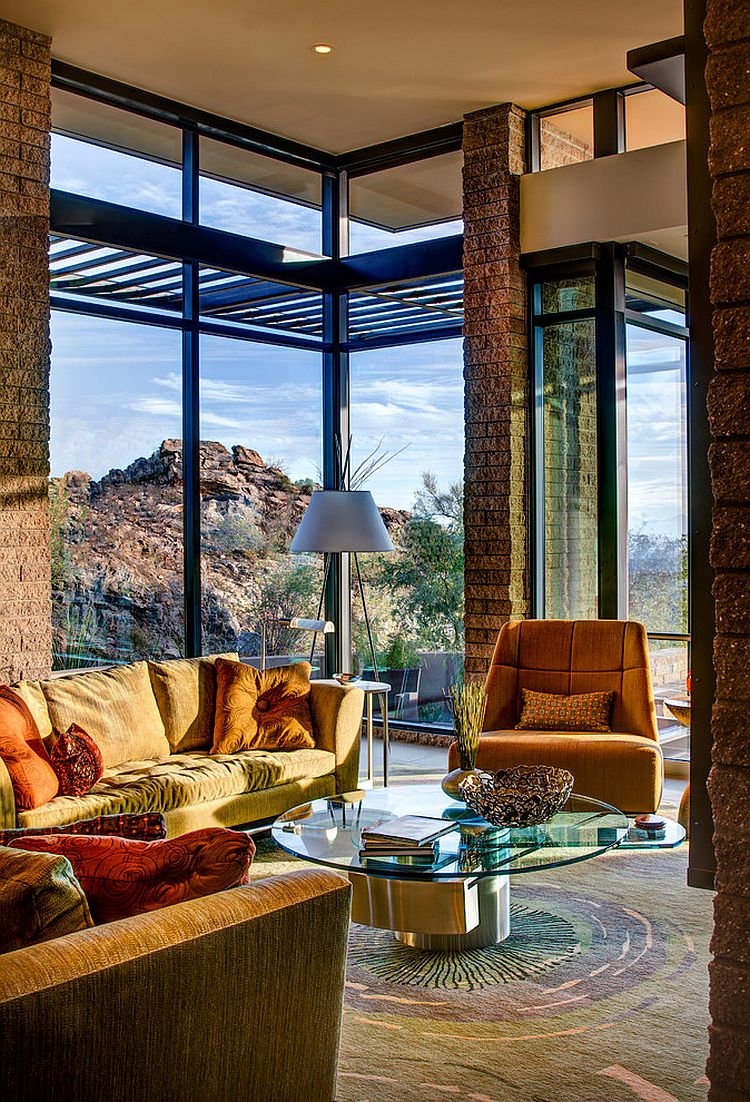 Exposed masonry and glass shape the stylish mountain home