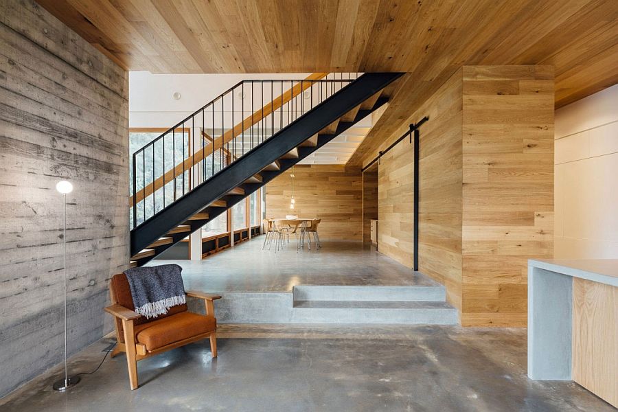 Extensive wooden cladding creates an inviting ambaince inside the functional Aussie home