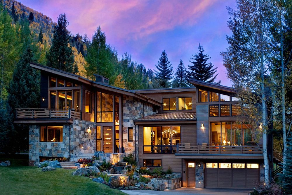 Exterior of the Ptarmigan Residence clad in natural dry-stack stone, copper paneling and clear cedar siding