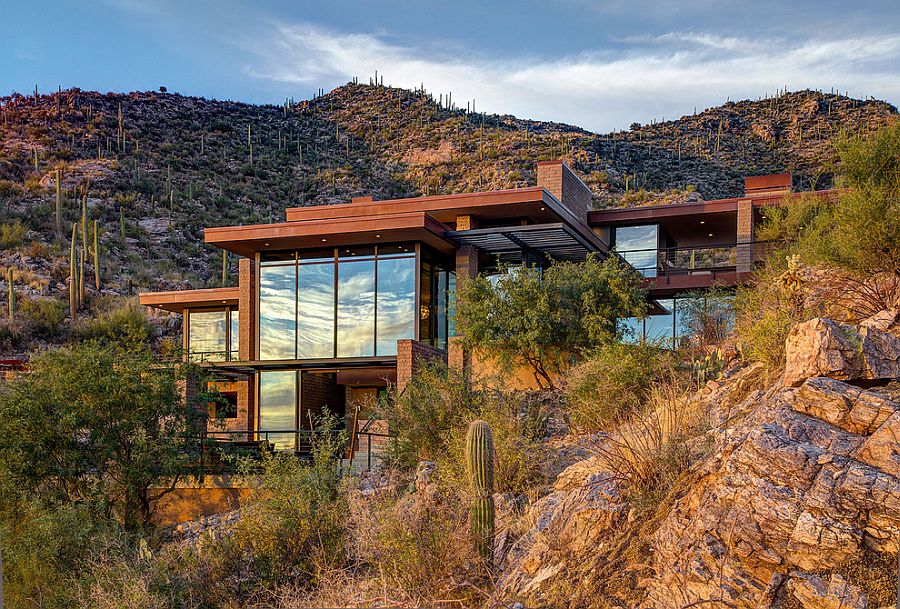 Exterior of the home in Tucson blends in with the natural mountain landscape