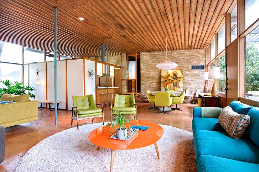 Fabulous midcentury modern living room with original brick walls and flooring from 1950s