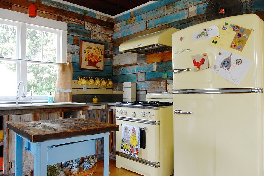 Farmhouse and shabby chic styles meet in this kitchen with reclaimed wood walls