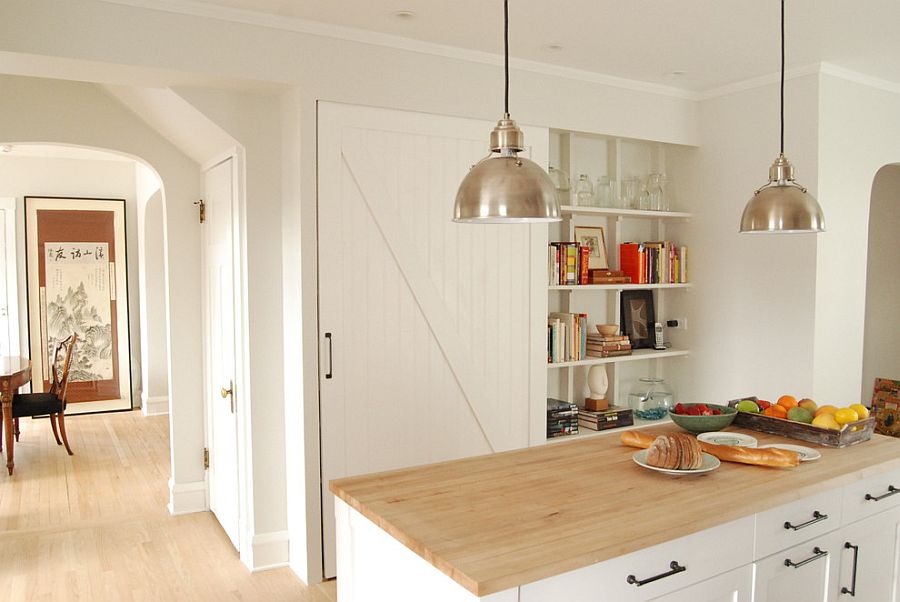 Farmhouse kitchen with a barn door for the pantry [Design: Rebekah Zaveloff – KitchenLab]