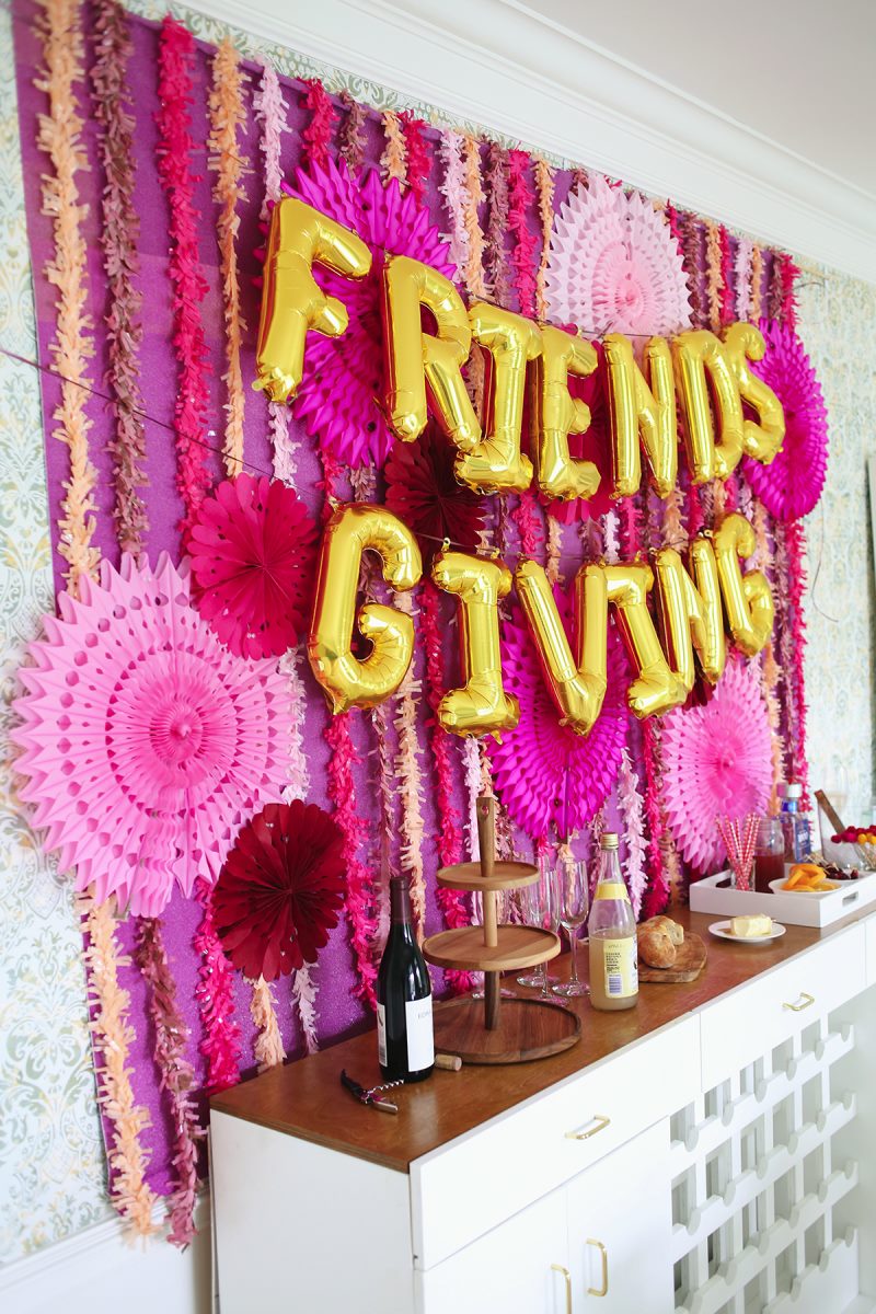 Friendsgiving party supplies in shades of pink