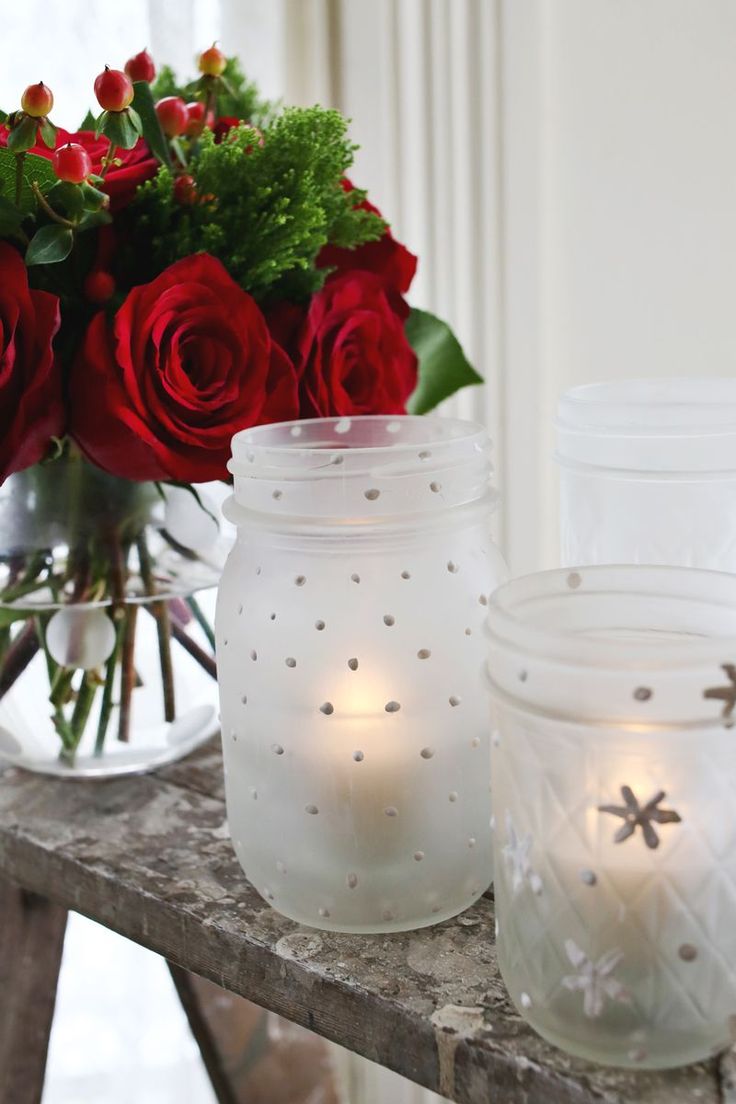 Frosted mason jar votives with snowflakes
