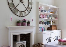 Giant-wall-clock-and-corner-hutch-add-personality-to-this-dining-room-217x155
