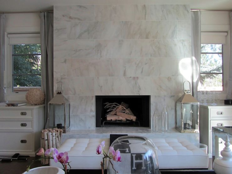 Glamorous living room with a marble fireplace