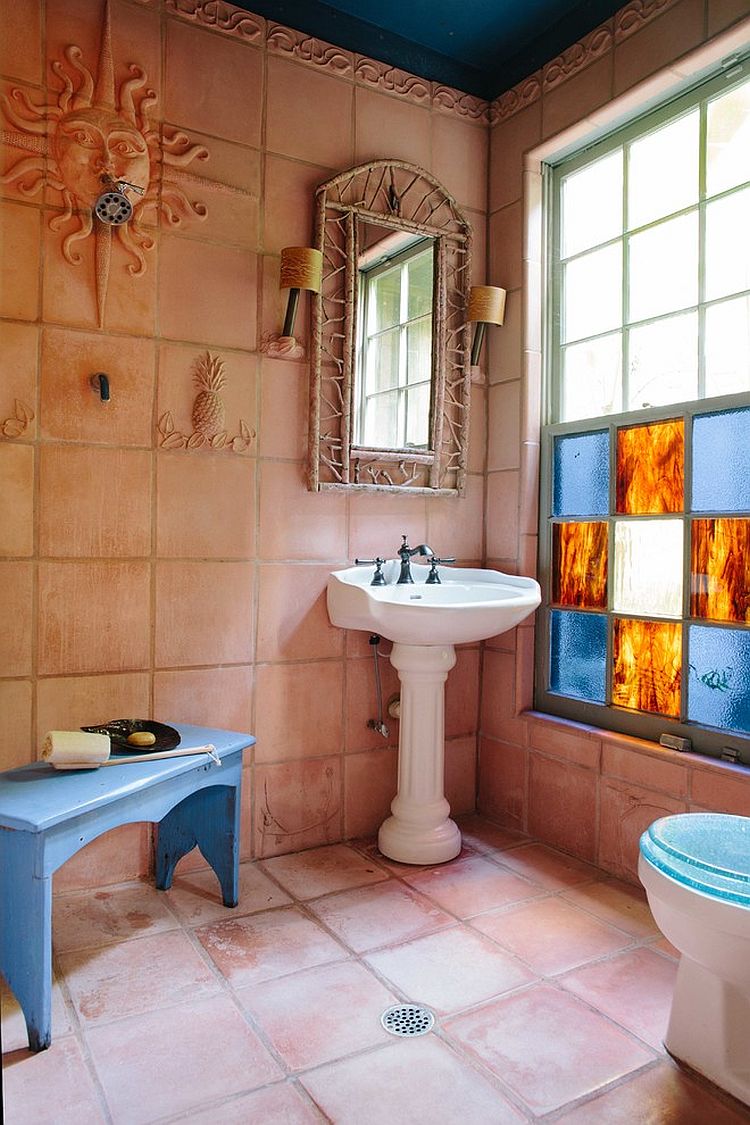 Gorgeous rustic bathroom with terracotta tiles for the wall and flooring