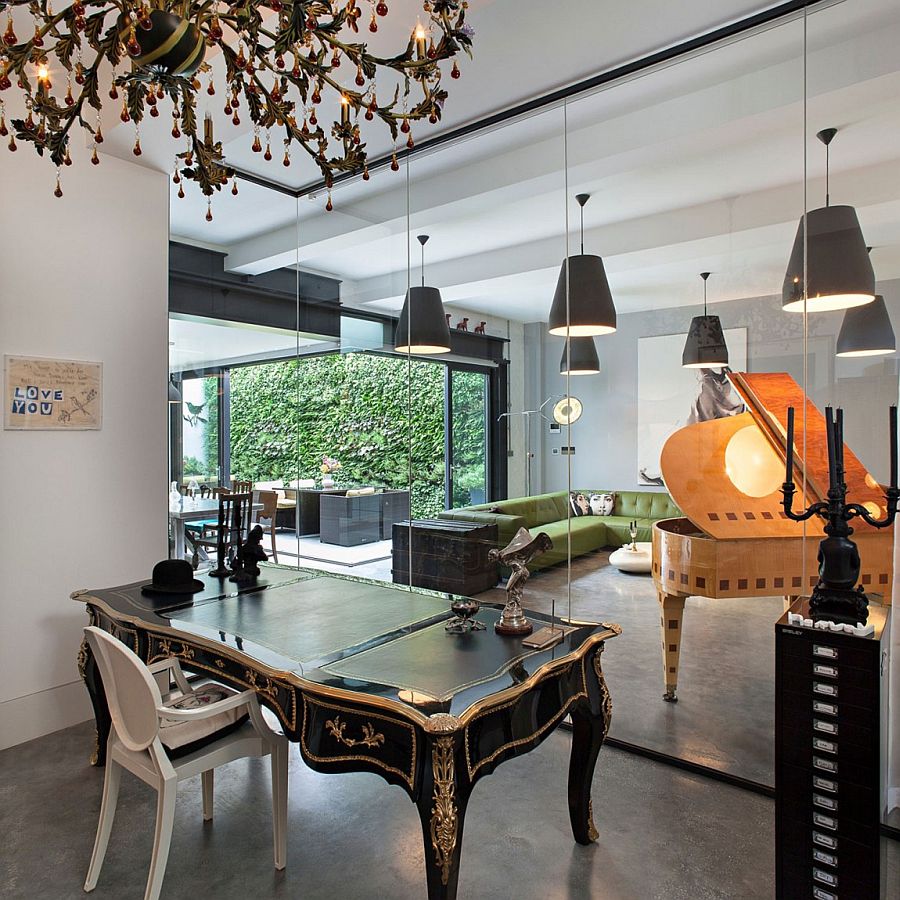 Home office with a Victorian desk and frameless glass walls