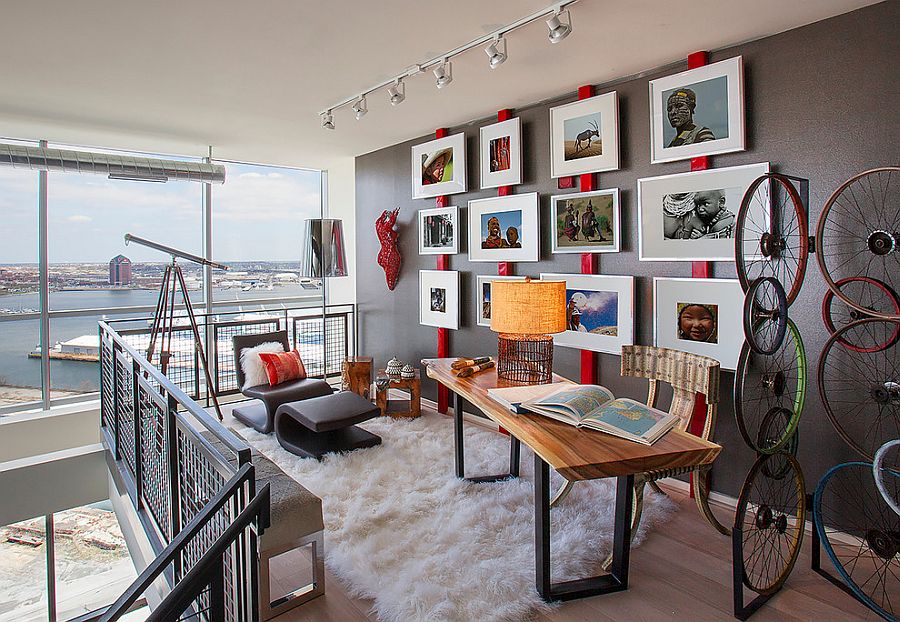 Industrial home office uses red in an ingenious and sporadic fashion [Design: Décoria Interior Designs]