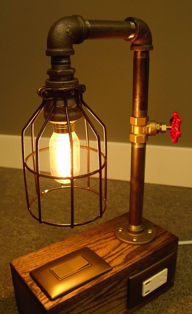 Industrial lamp with light switch, plugs, and USB ports from HomeProsPlus