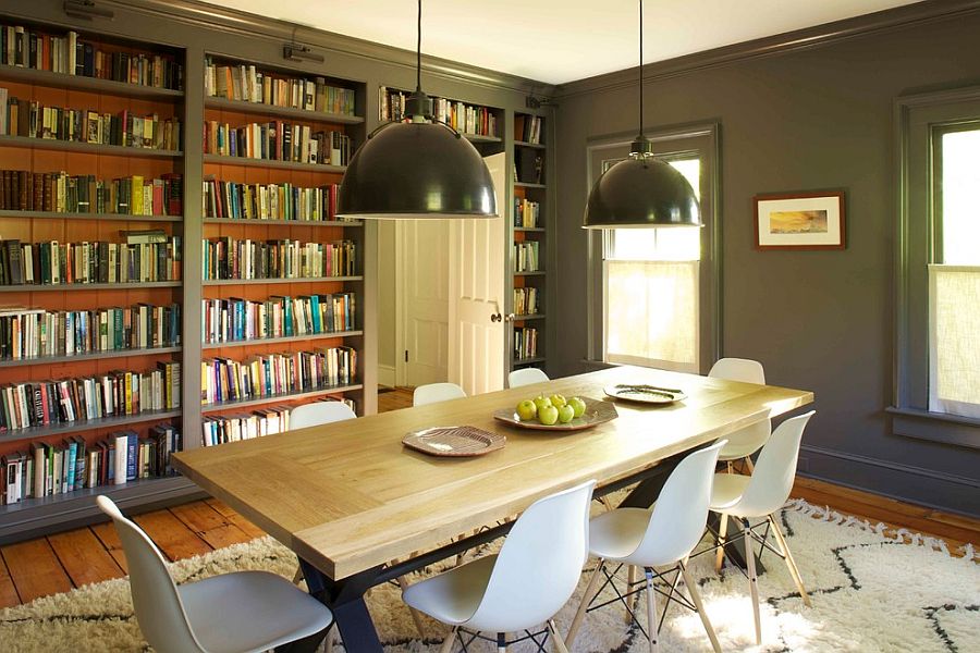 Industrial style lighting makes a grand visual statement in the library - dining room comb [Design: Kate Johns AIA]