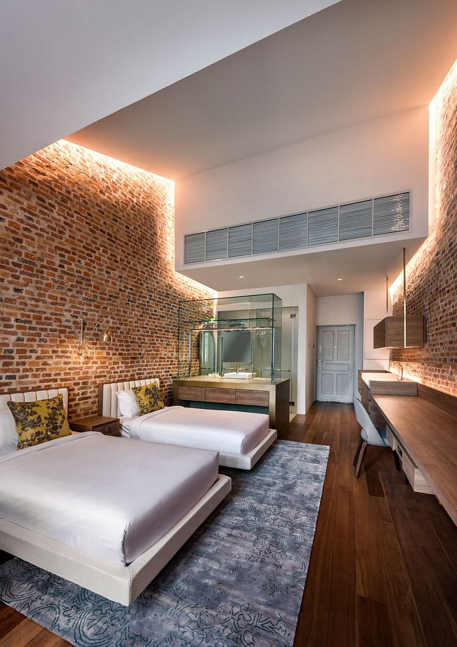 LED cove lighting for the brick walls creates a cozy, etheral setting inside the suites