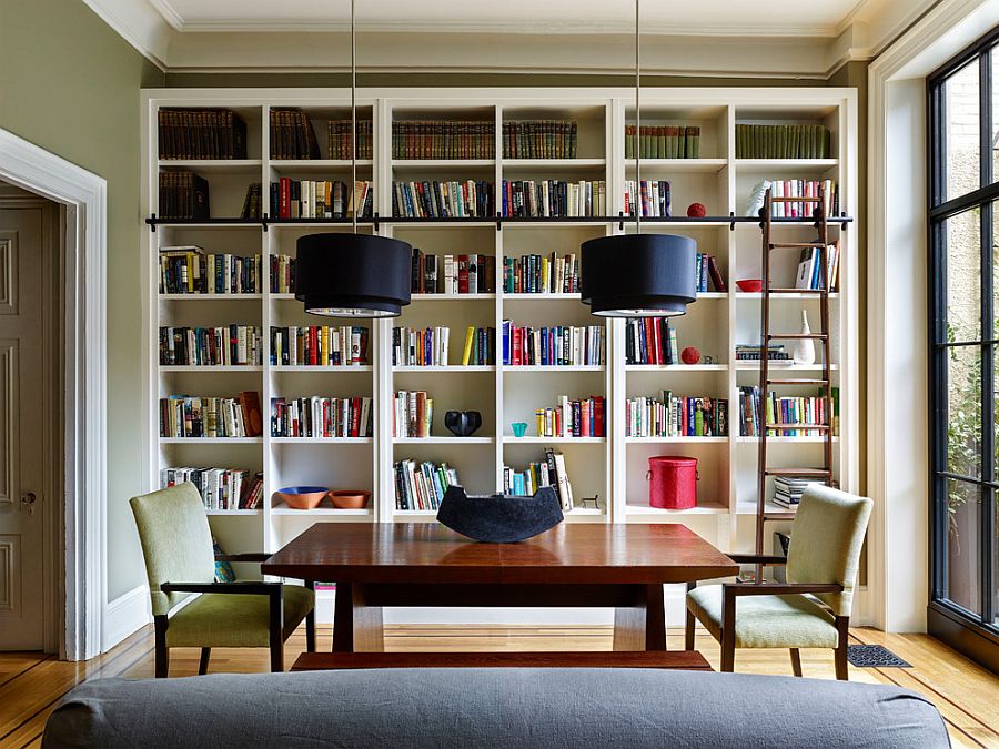 Ladder, bookshelves and bold pendants for the modern library [Design: Rasmussen / Su Architects / Jeffrey Totaro Photographer]