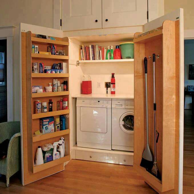 Large closet hiding laundry with extra functional doors for extra storage