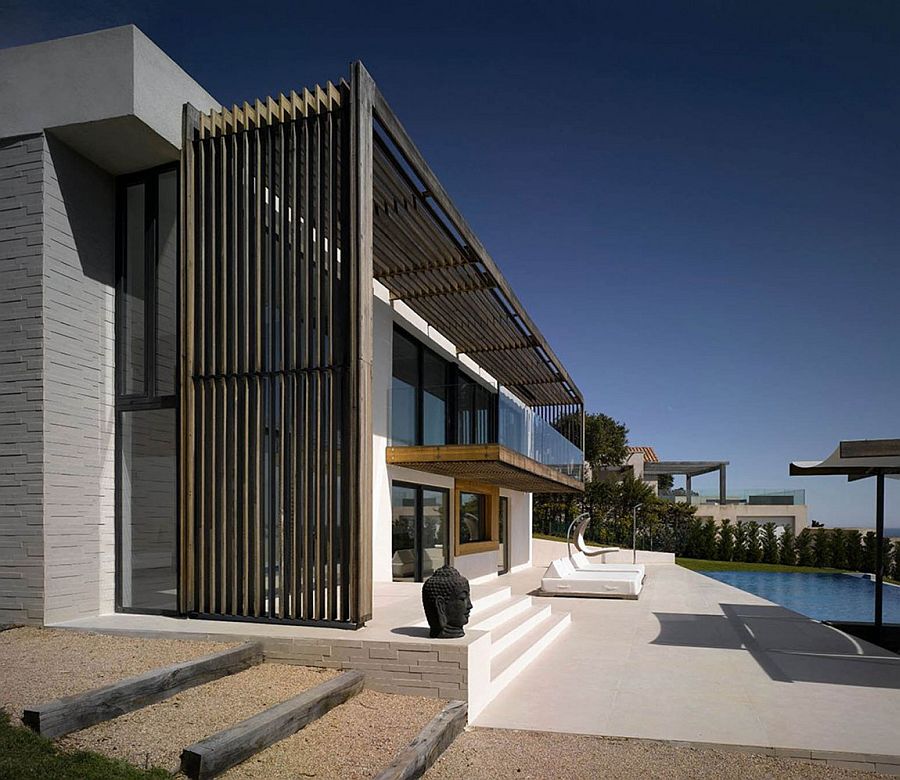 Lavish outdoor deck and pool area of Villa Brash in France