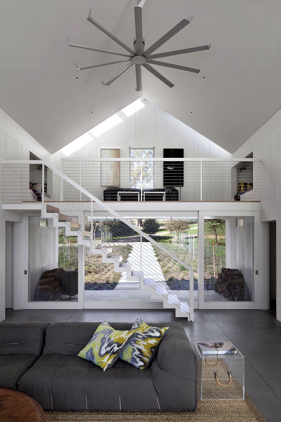 Light-filled living area with large sliding doors and a neutral color scheme