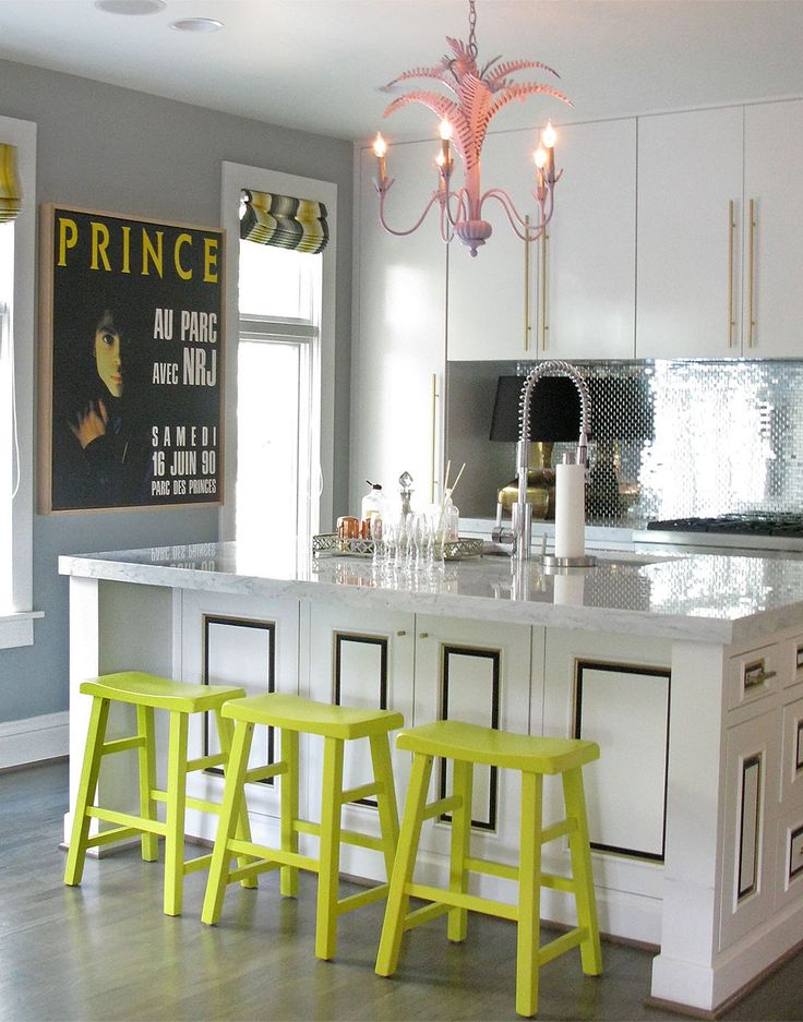 Lime green bar stools and small accents in a kitchen