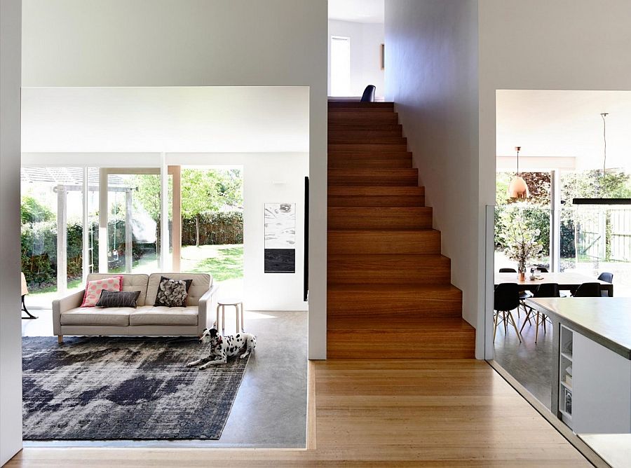 Living areas on the lower elvel of the extension with narrow staircase leading to the top floor