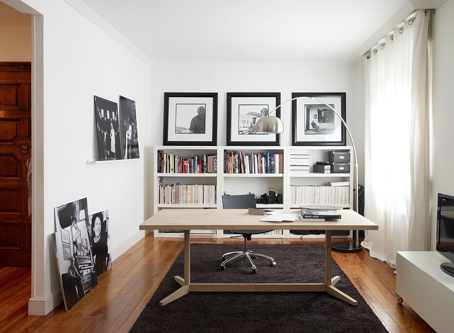 Lovely desk brings warmth of wood to the contemporary home office in black and white