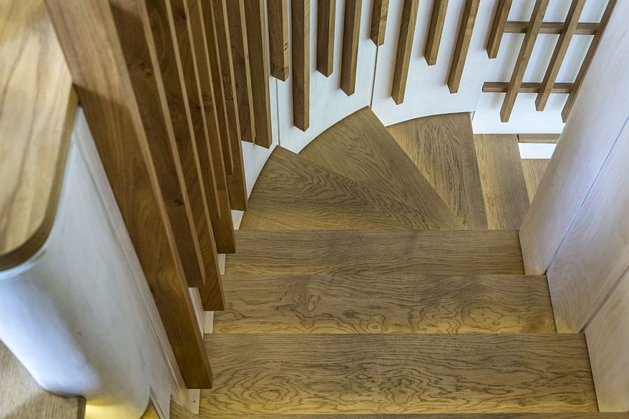 Lovely use of LED lighting strips to illuminate the wooden staircase